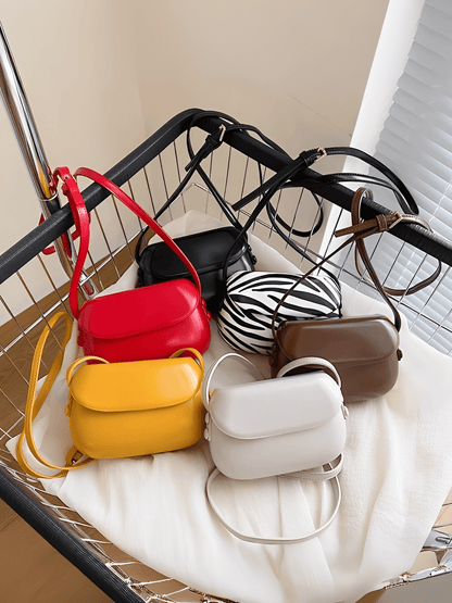 Bolsa Feminina em Couro PU com Design Arredondado Fecho Magnético e Alça Regulável – Odete