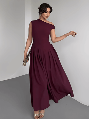Vestido Maxi com Ombro Assimétrico e Saia Plissada Sofisticada – Luana