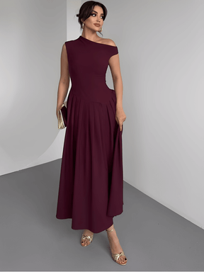 Vestido Maxi com Ombro Assimétrico e Saia Plissada Sofisticada – Luana