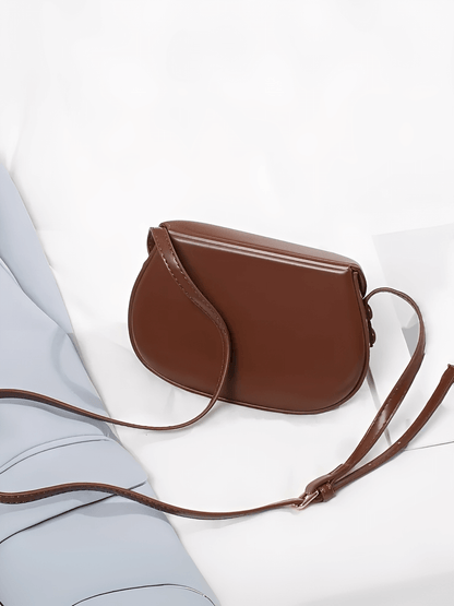 Bolsa Feminina em Couro PU com Design Arredondado Fecho Magnético e Alça Regulável – Odete