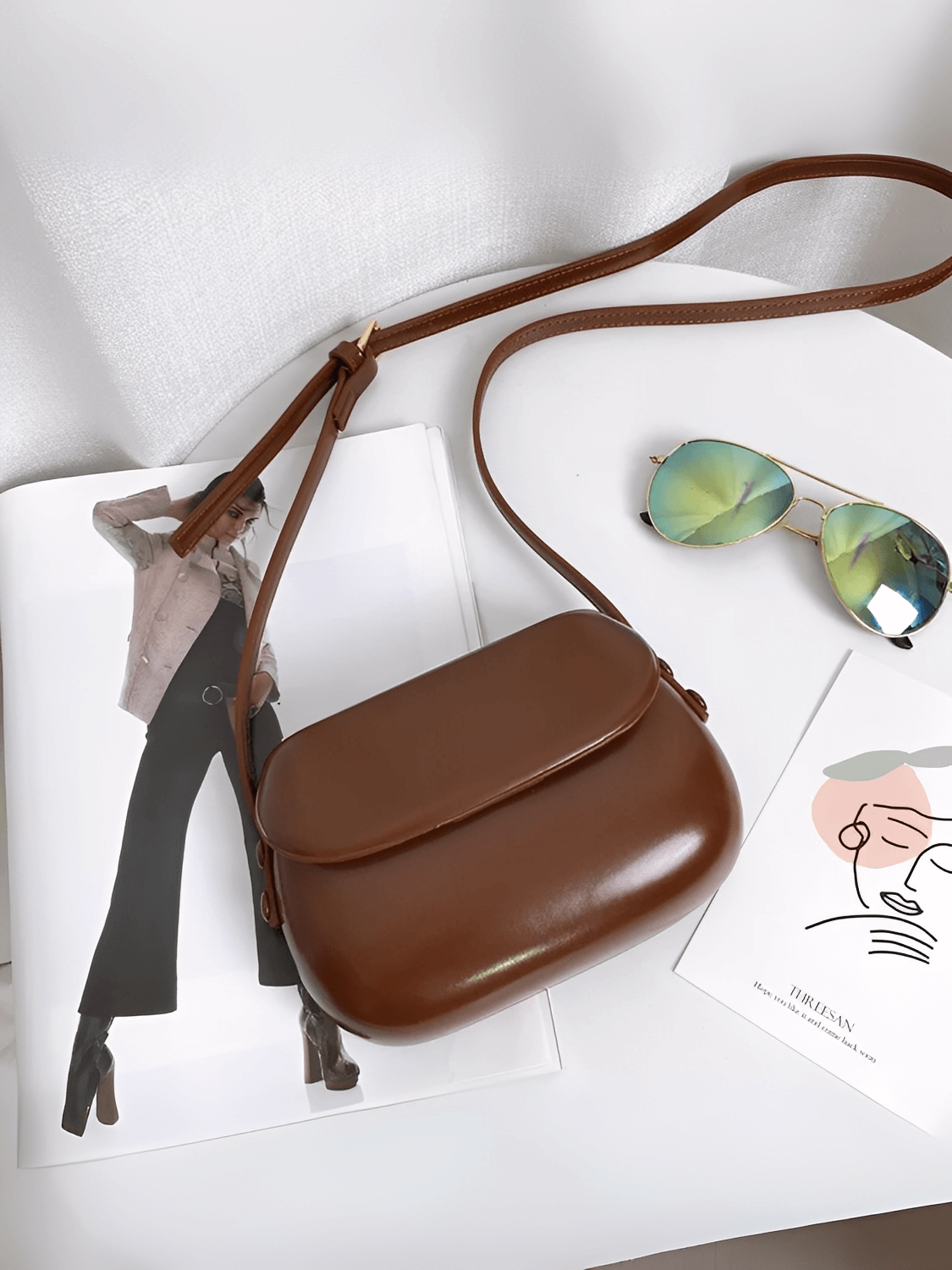 Bolsa Feminina em Couro PU com Design Arredondado Fecho Magnético e Alça Regulável – Odete