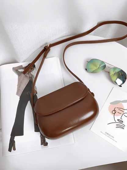 Bolsa Feminina em Couro PU com Design Arredondado Fecho Magnético e Alça Regulável – Odete