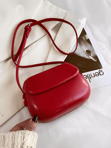 Bolsa Feminina em Couro PU com Design Arredondado e Alça Regulável – Odete