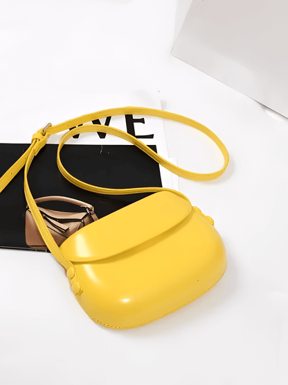 Bolsa Feminina em Couro PU com Design Arredondado Fecho Magnético e Alça Regulável – Odete